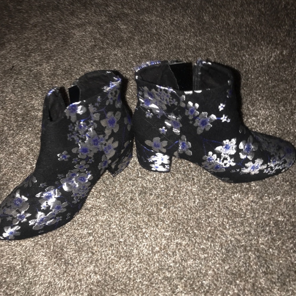 Black booties with flower detail